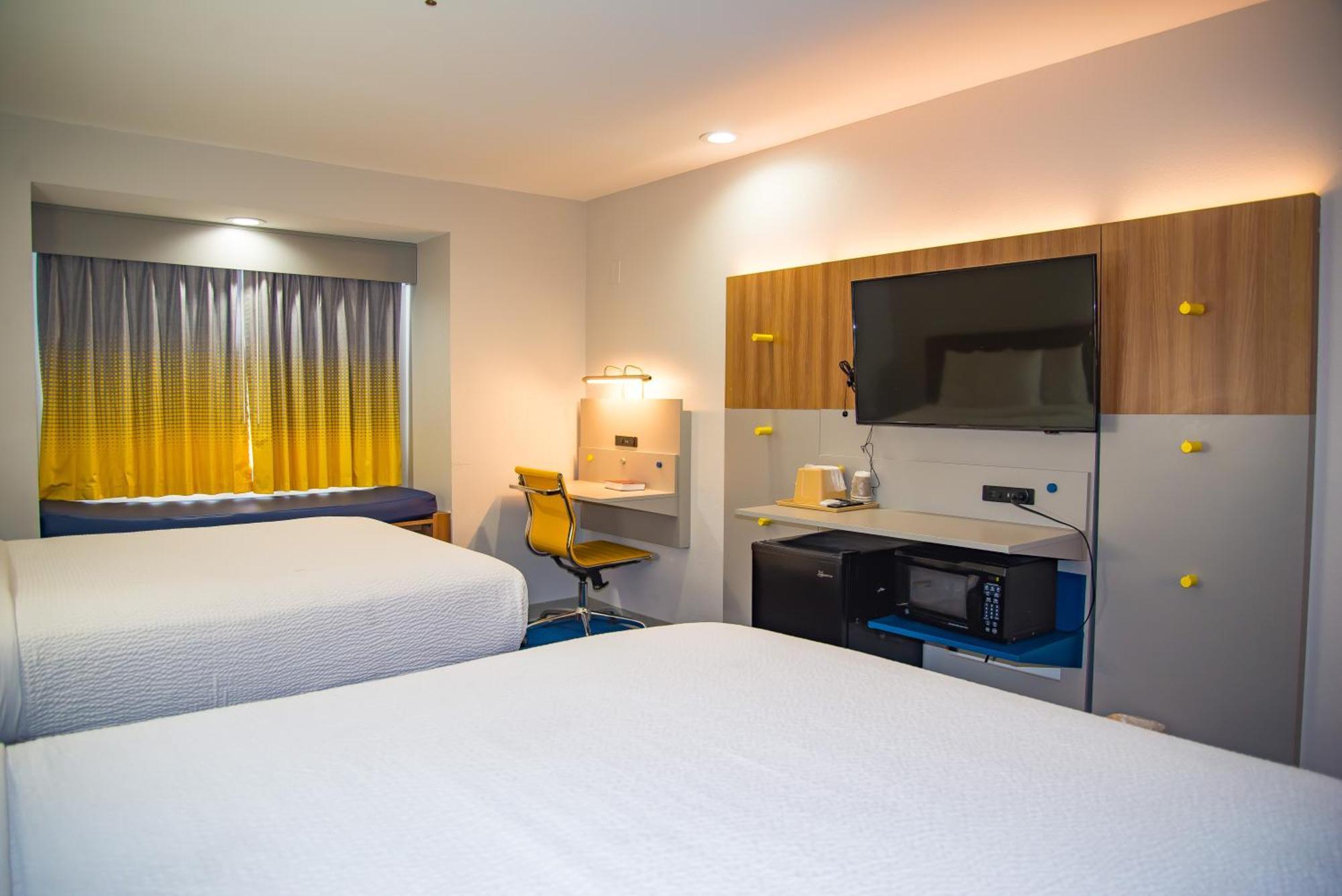 Microtel Inn & Suites By Wyndham Дафне Экстерьер фото